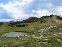 Lago alpino in prossimità della sella tra la Colma dei Lavaggi ed il monte Camparient